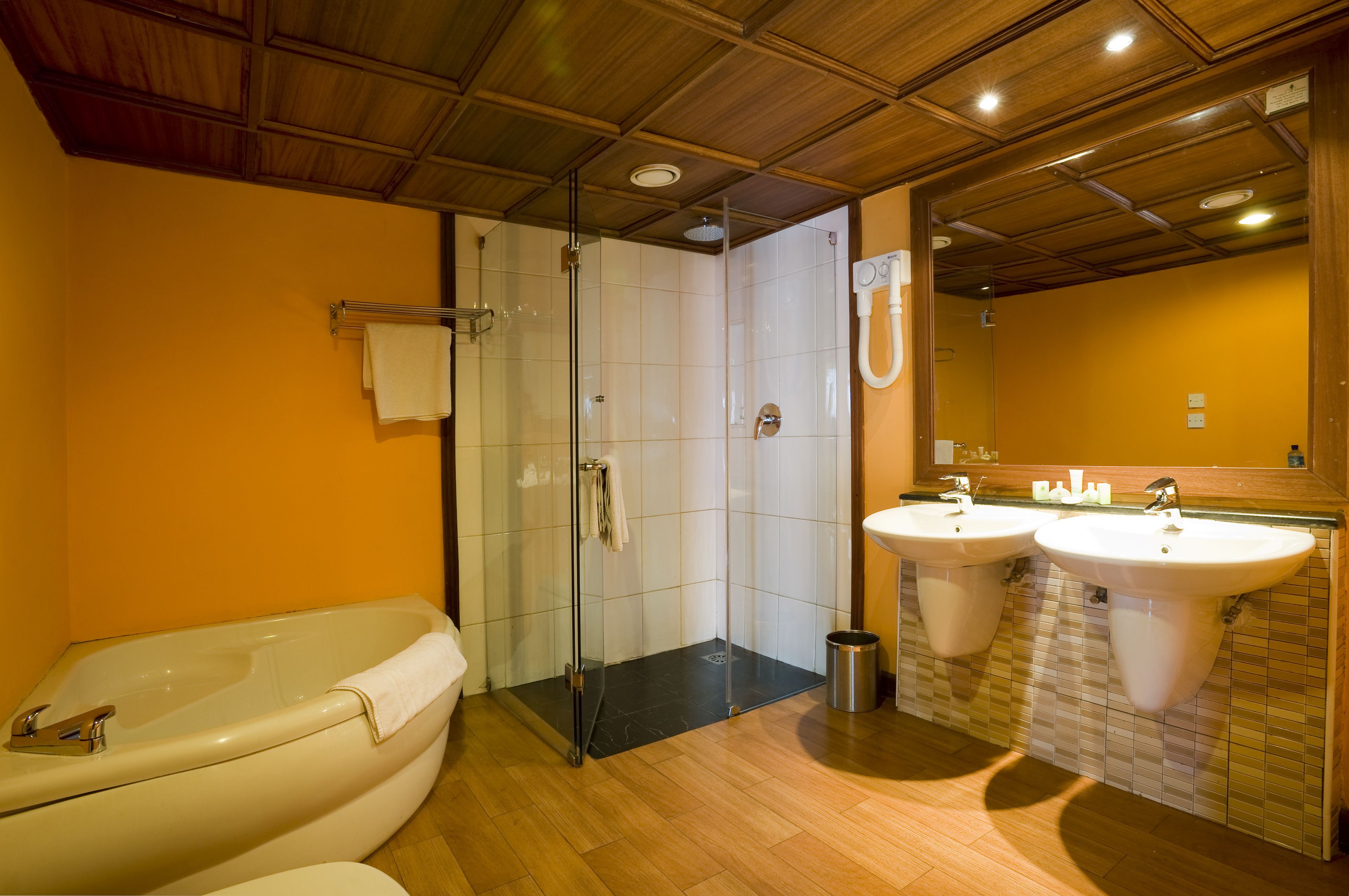 separate bathtub and shower, free toiletries, hair dryer, towels