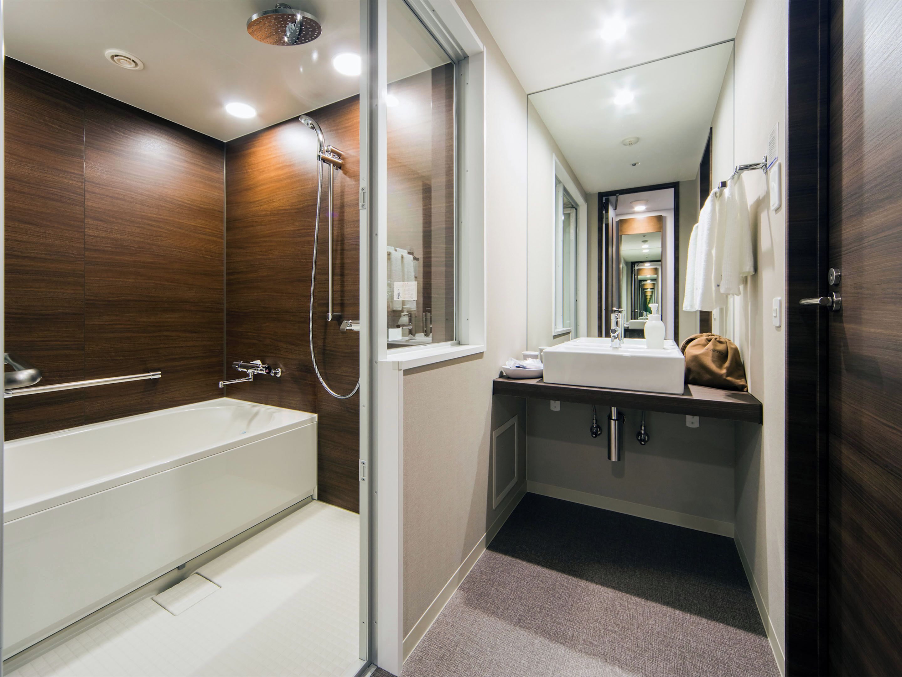 combined shower/bathtub, deep-soaking bathtub, rainfall showerhead