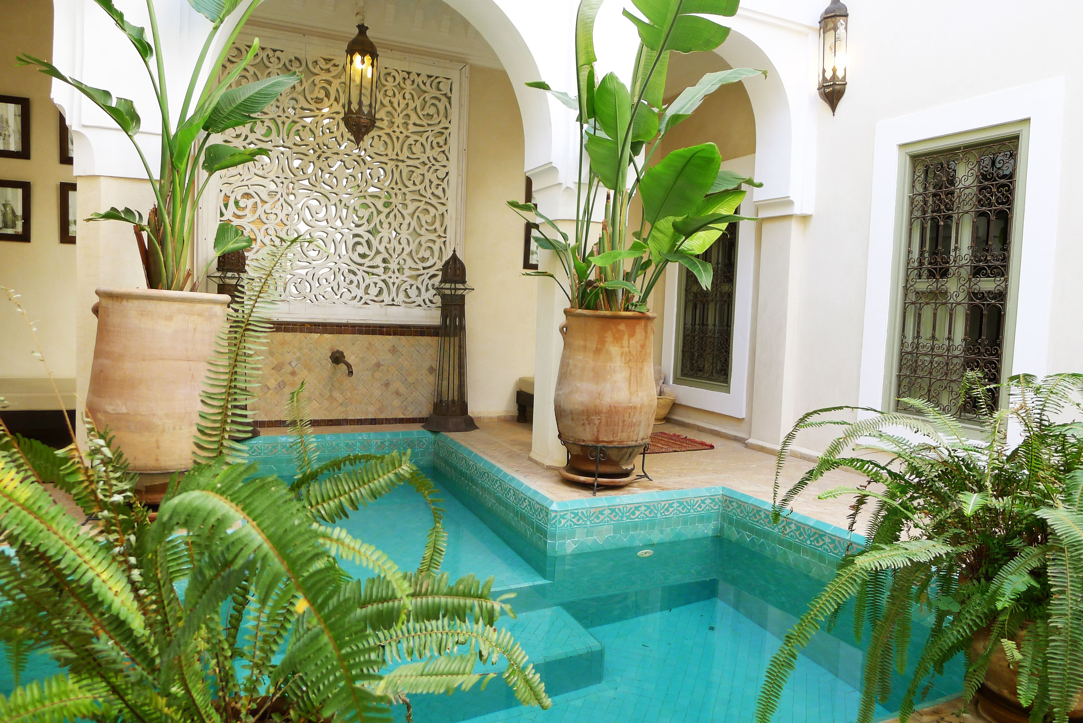 Indoor pool, pool umbrellas, sun loungers