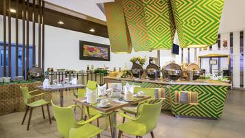 Breakfast, lunch, dinner served; international cuisine