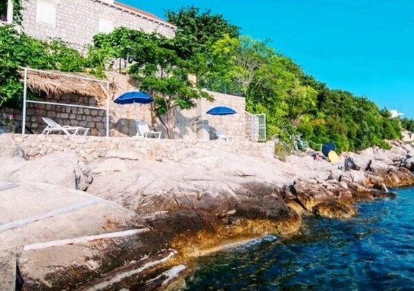 Praia particular, serviço de traslado de/para a praia, espreguiçadeiras 