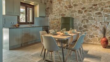 Apartment, 2 Bedrooms | Private kitchen | Full-sized fridge, oven, stovetop, coffee/tea maker