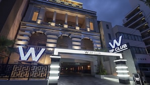 A hotel entrance with a large illuminated 'W' sign and 'W ZIP CLUB' signage. - Design Hotel W Zip Club - Adults Only (Nagoya)