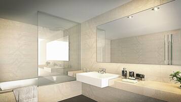 Junior Suite, 1 King Bed | Bathroom | Designer toiletries, hair dryer, bathrobes, slippers