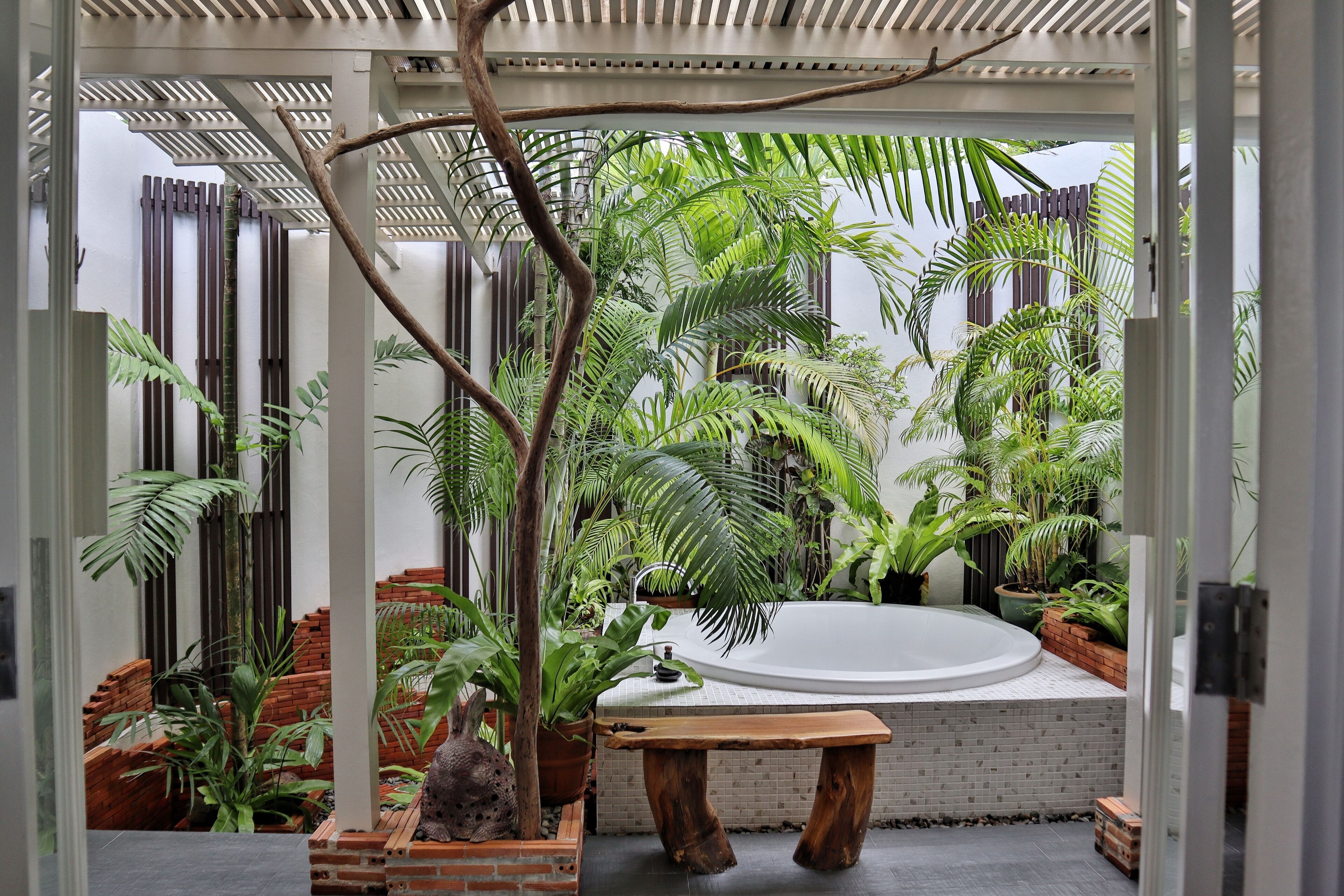 shantaa extra sweet (a king size bed) | bathroom | separate bathtub and shower, rainfall showerhead, free toiletries