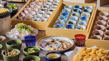 A variety of food items and dishes displayed in multiple containers.