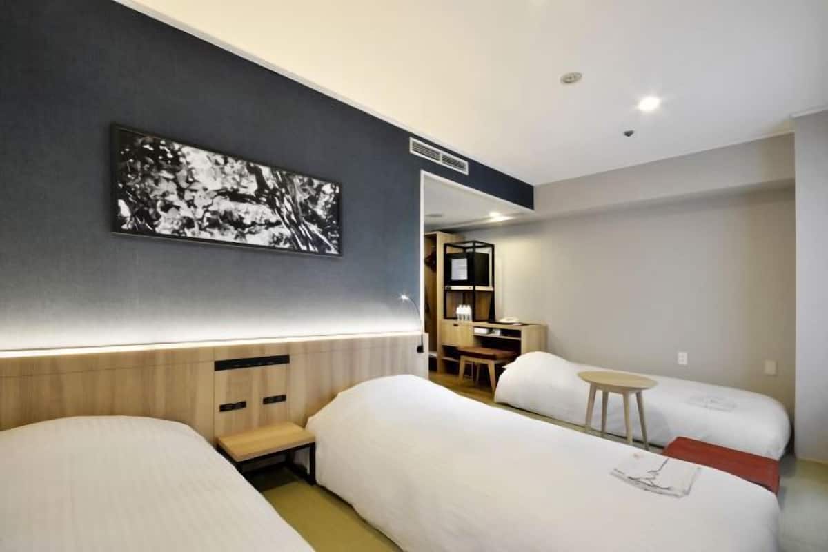 Premium bedding, down duvets, in-room safe, desk