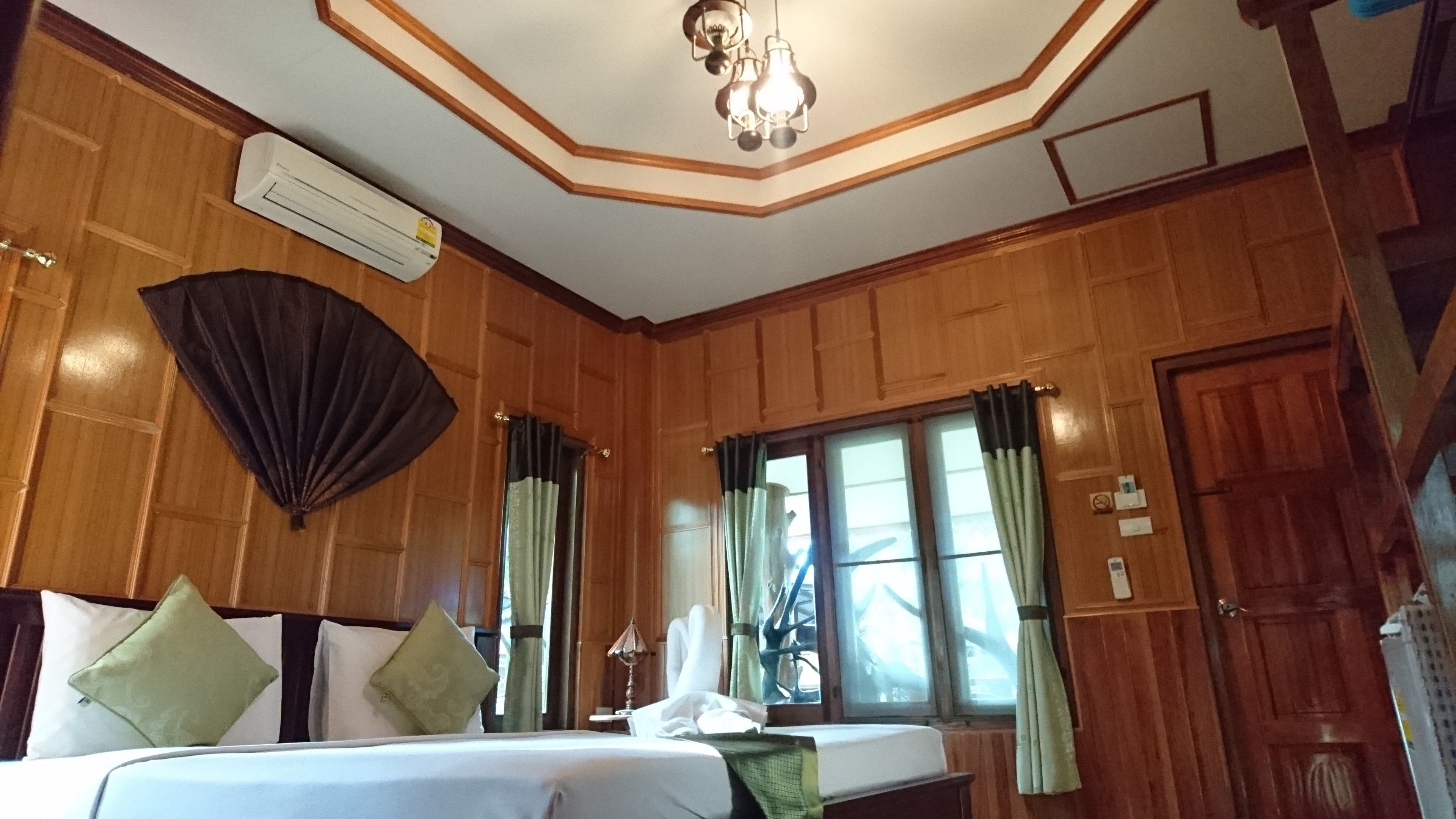 deluxe double room, 1 king bed, garden view | free minibar items, in-room safe, blackout curtains, free wifi