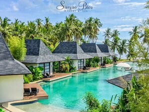 Outdoor pool, sun loungers - Siargao Bleu Resort And Spa (General Luna)