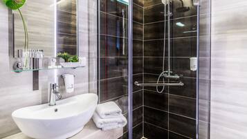 Shower, free toiletries, hair dryer, slippers