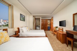 Deluxe Triple Room, City View | Minibar, in-room safe, individually decorated, individually furnished - Titan Hotel (Da Nang)