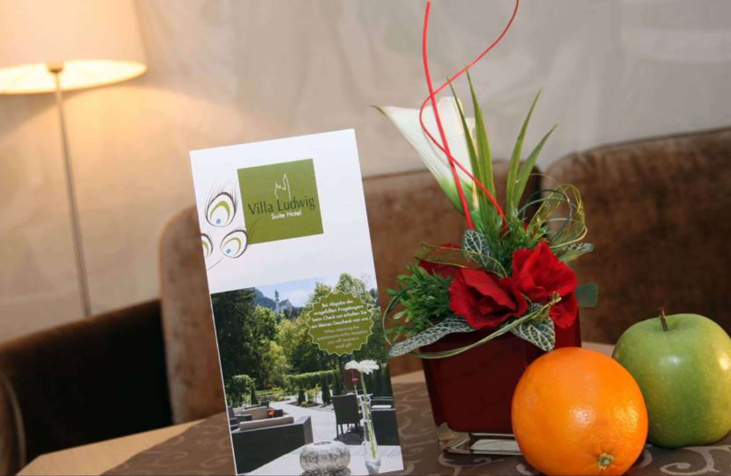 romantic double room | living area | flat-screen tv