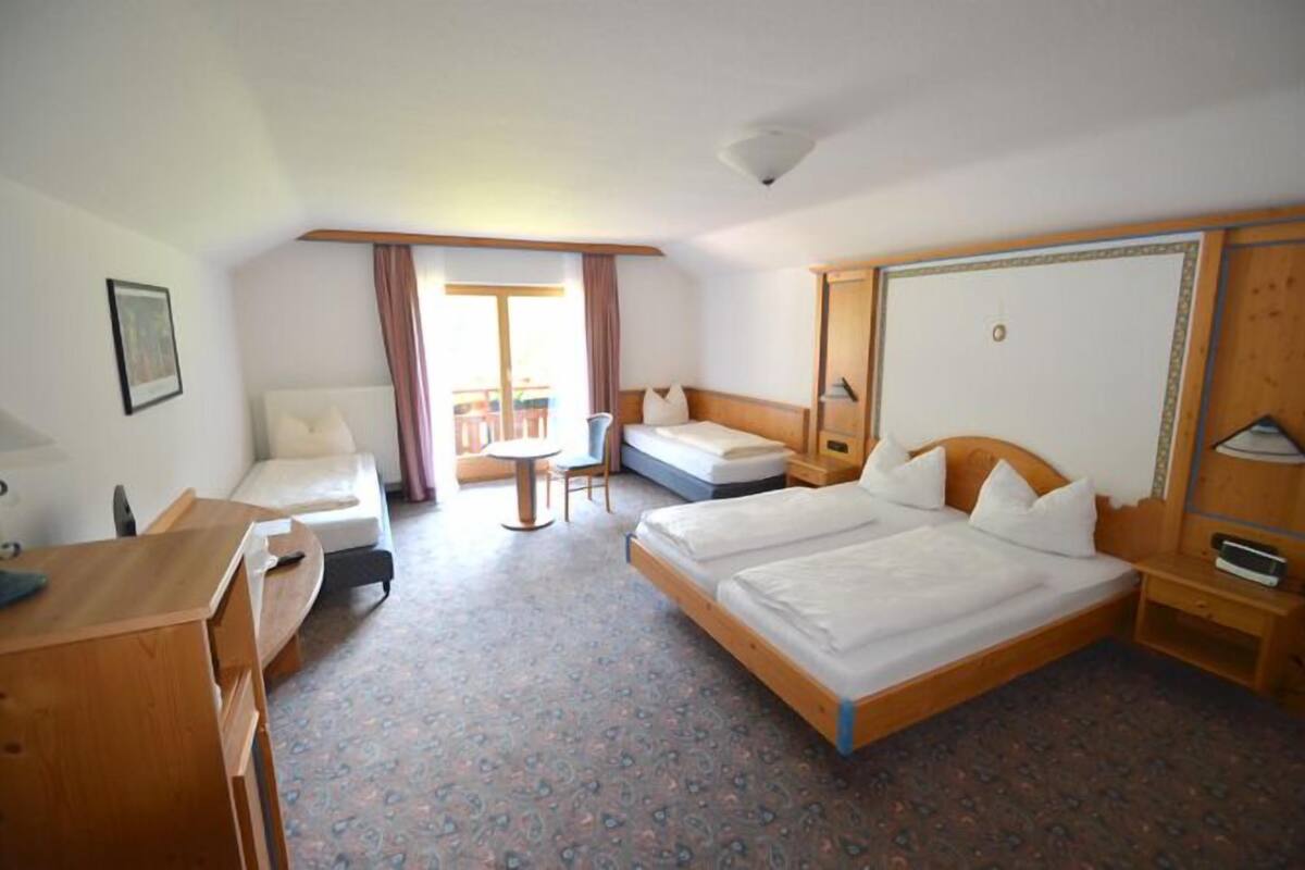 quadruple room, garden view | desk, free cots/infant beds