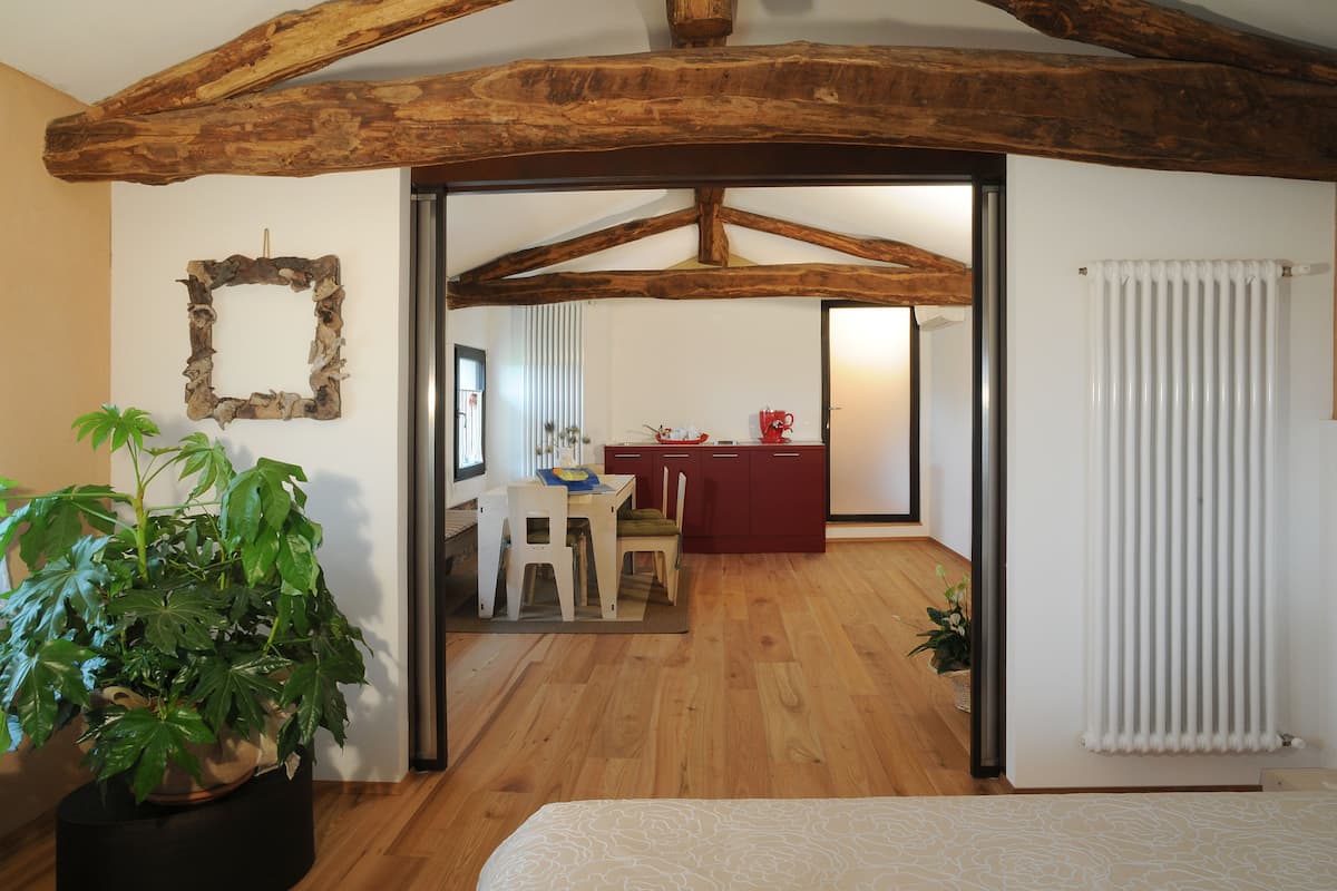 Superior Suite, 2 Bedrooms, Garden View, Tower | Living area | TV