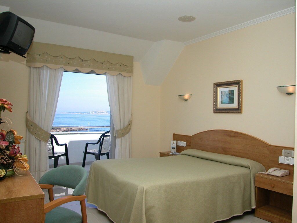 desk, blackout curtains, free cots/infant beds, rollaway beds