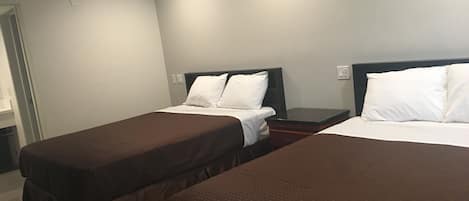 Room, 2 Queen Beds | Soundproofing, iron/ironing board, free WiFi, bed sheets