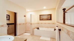 A modern bathroom with a freestanding bathtub, a large sink, and a mirror above the sink. - Baobab Beach Resort (Diani Beach)