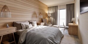 Ein modernes Hotelzimmer mit einem großen Bett, Nachttischen, einem Schreibtisch und einem Sessel.
