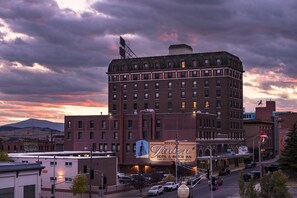 A historic hotel with a prominent sign, multiple stories, and a classic architectural style. - Finlen Hotel and Motor Inn (Butte)