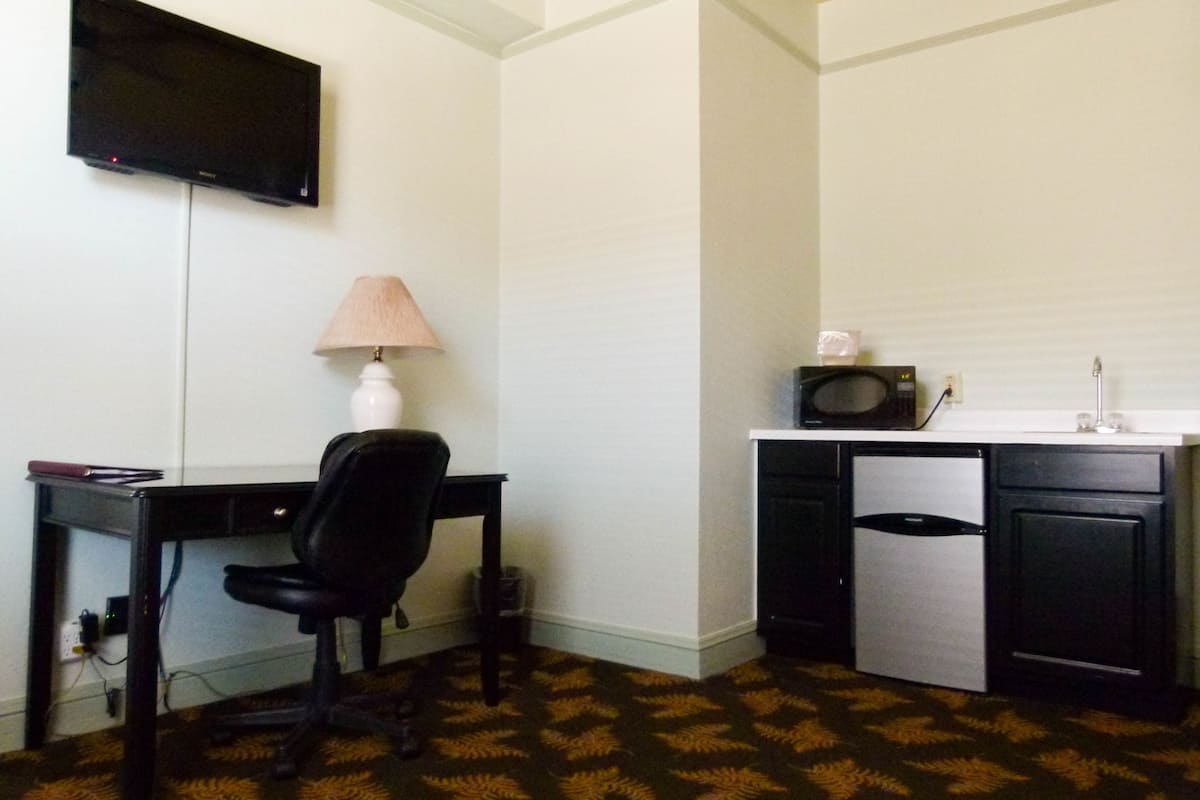 suite, 1 king bed with sofa bed, non smoking | desk, iron/ironing board, free wifi, bed sheets