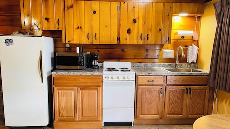 Standard Kitchenette Room with Two Queen Beds | Private kitchen | Mini-fridge, microwave, coffee/tea maker