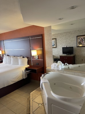 Habitación individual Deluxe | Caja de seguridad en la habitación y escritorio