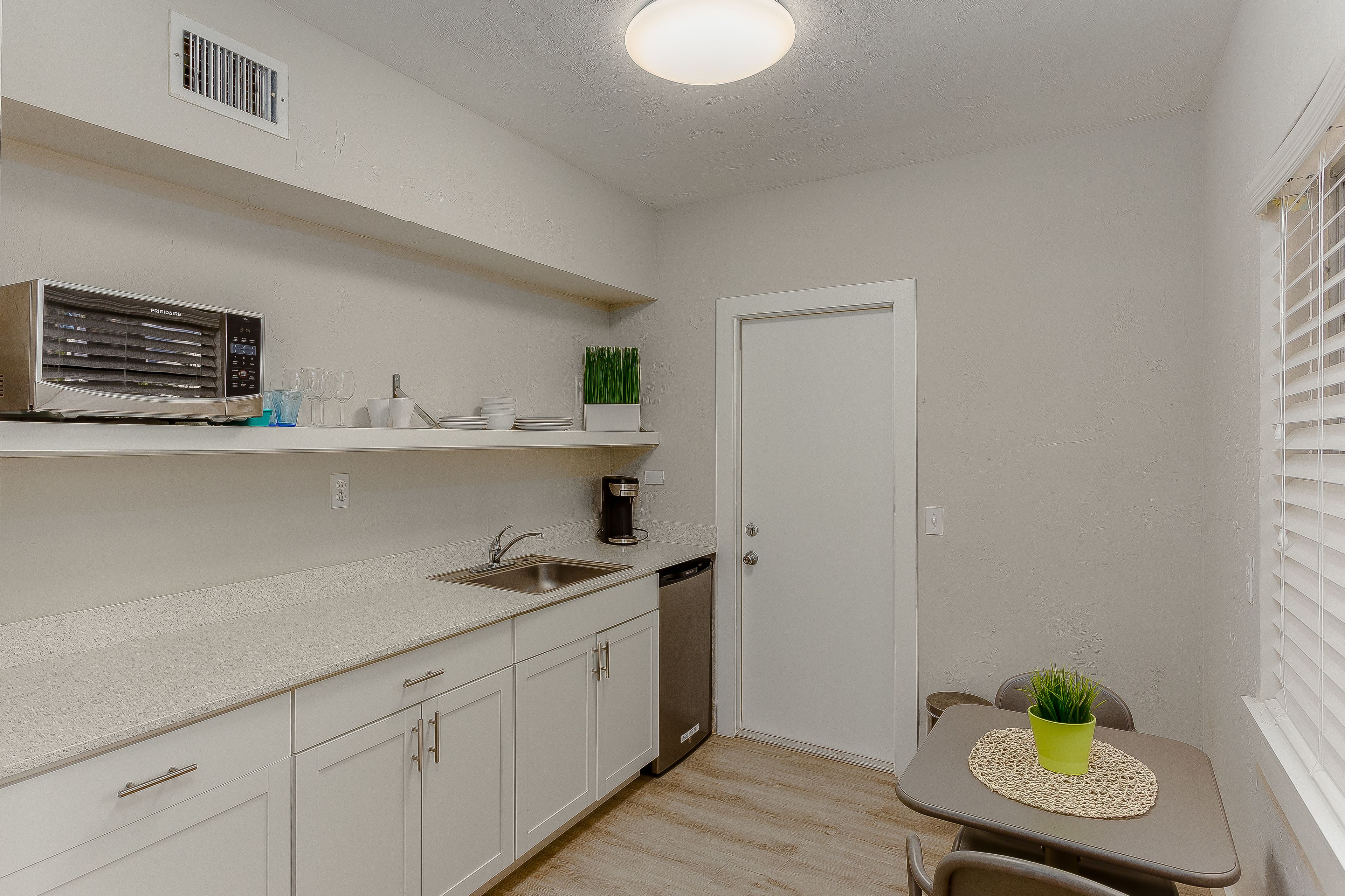 superior suite, kitchenette | private kitchen | fridge, coffee/tea maker