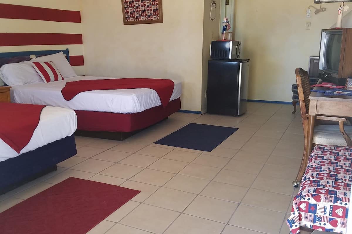 Design Room, 2 Queen Beds | Individually furnished, iron/ironing board, free WiFi, bed sheets
