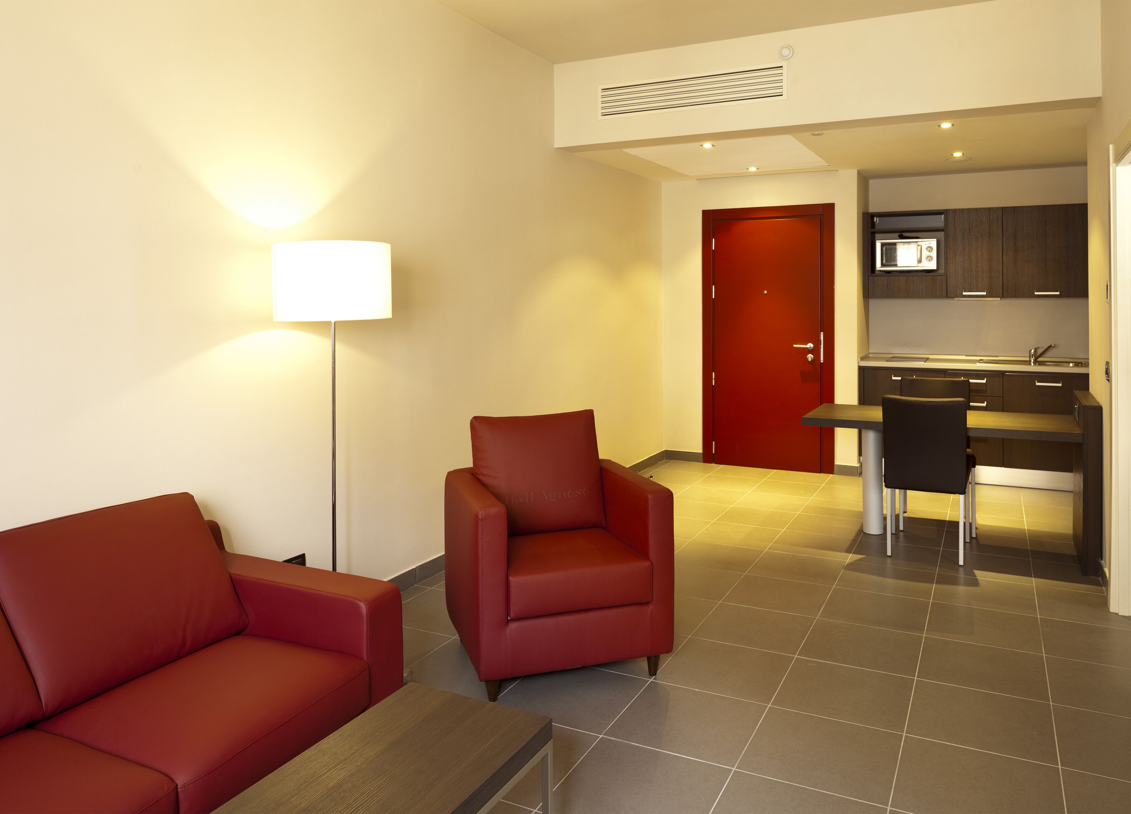 executive suite, kitchenette | living area | flat-screen tv