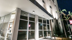 A hotel with a modern facade, large windows, and a prominent signage. - ibis Sinop (Sinop)