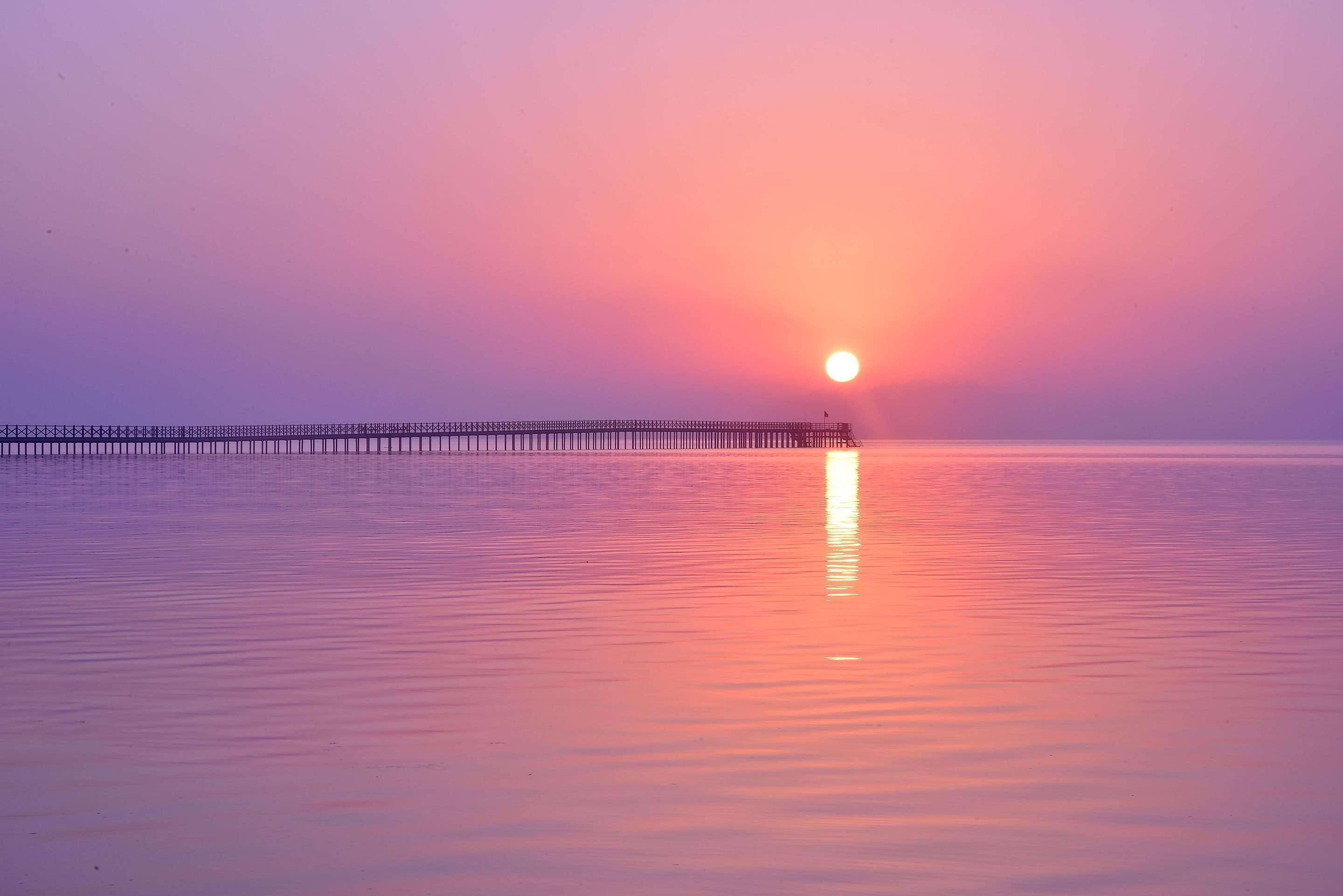 on the beach, white sand, sun-loungers, beach umbrellas