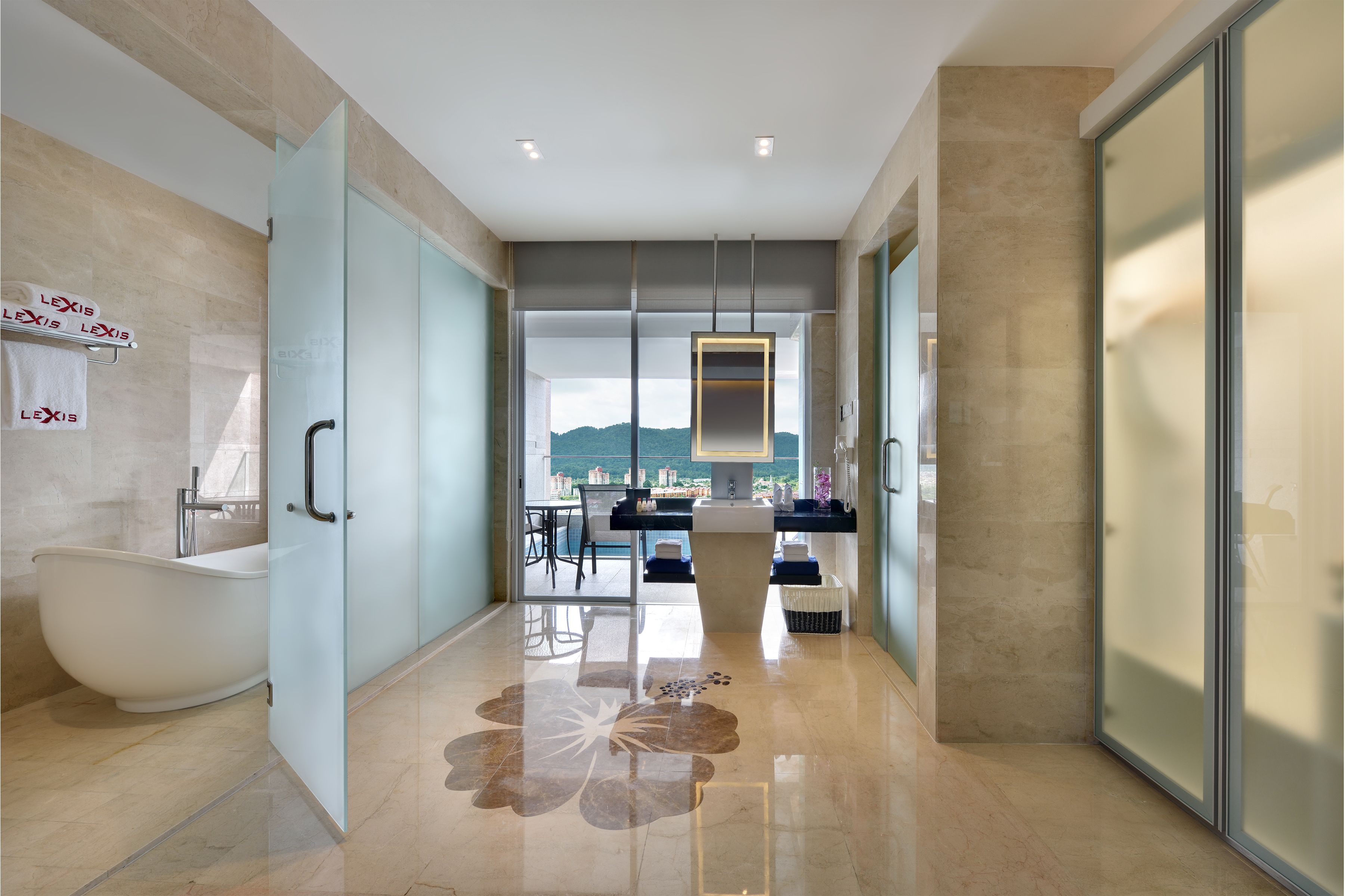 executive pool suite | bathroom | separate bathtub and shower, rainfall showerhead, free toiletries