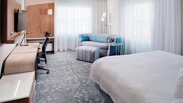 Premium bedding, down comforters, desk, laptop workspace