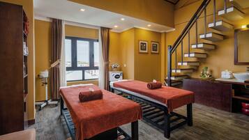 Relax in this serene space with two massage tables and a peaceful atmosphere.