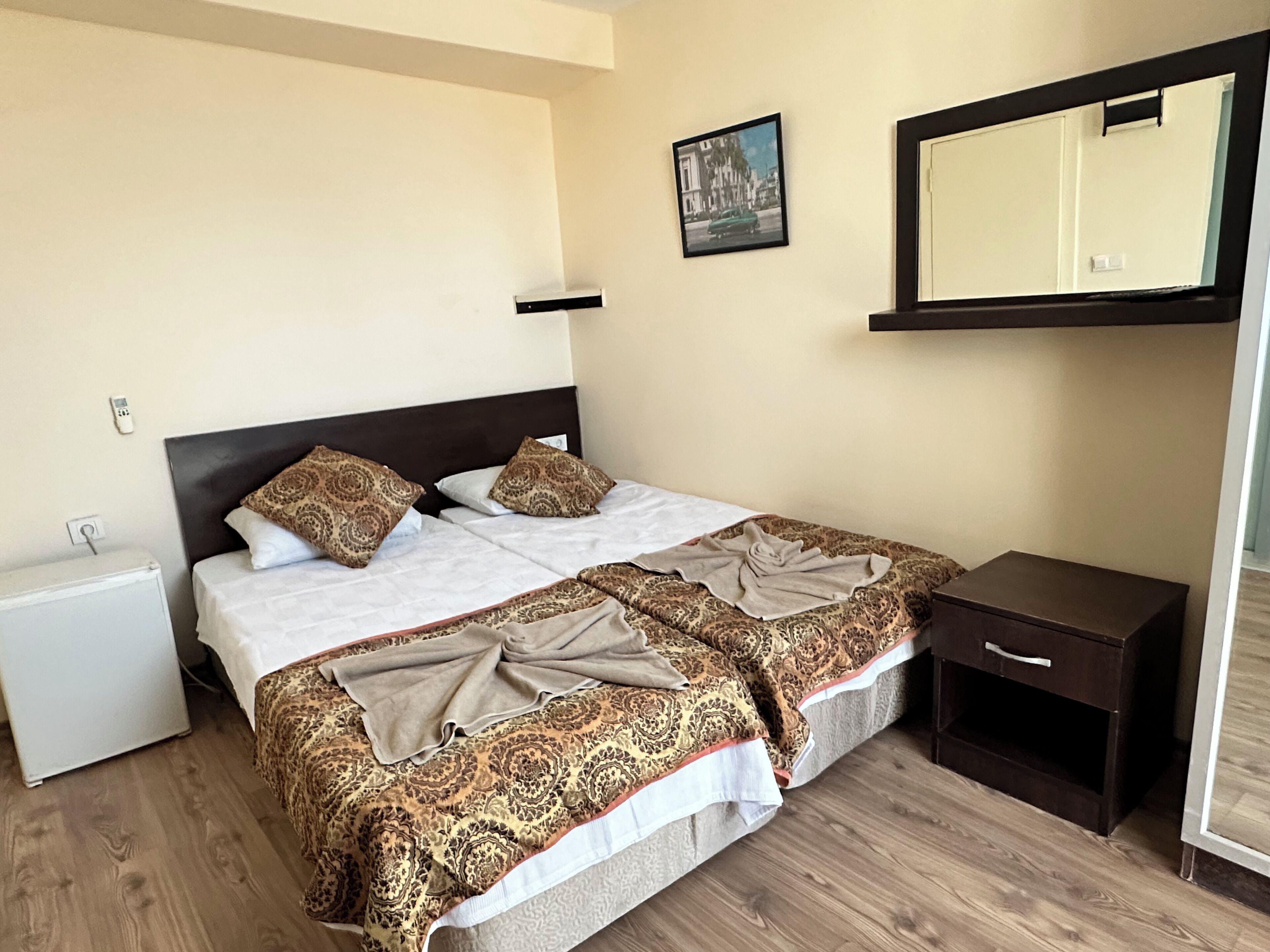 Economy Room, 2 Twin Beds, City View | Premium bedding, in-room safe, free WiFi, bed sheets