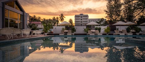 Outdoor pool, open 8:00 AM to 9:00 PM, free cabanas, pool umbrellas