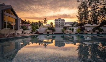 Outdoor pool, open 8:00 AM to 11:00 PM, free cabanas, pool umbrellas