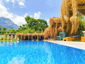 Outdoor pool, pool umbrellas, pool loungers
