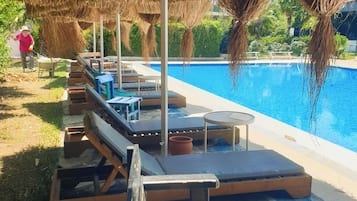 Outdoor pool, pool umbrellas, pool loungers