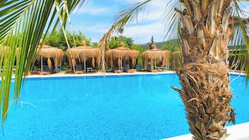 Outdoor pool, pool umbrellas, sun loungers