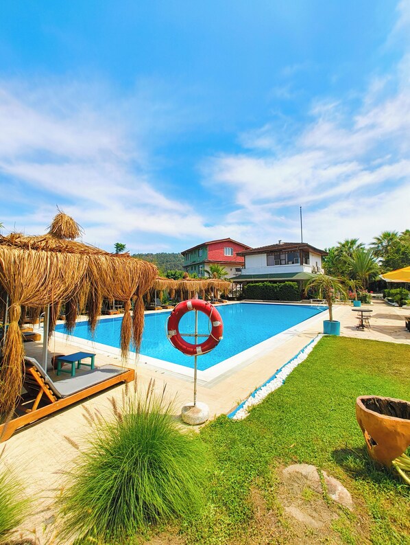 Outdoor pool, pool umbrellas, pool loungers