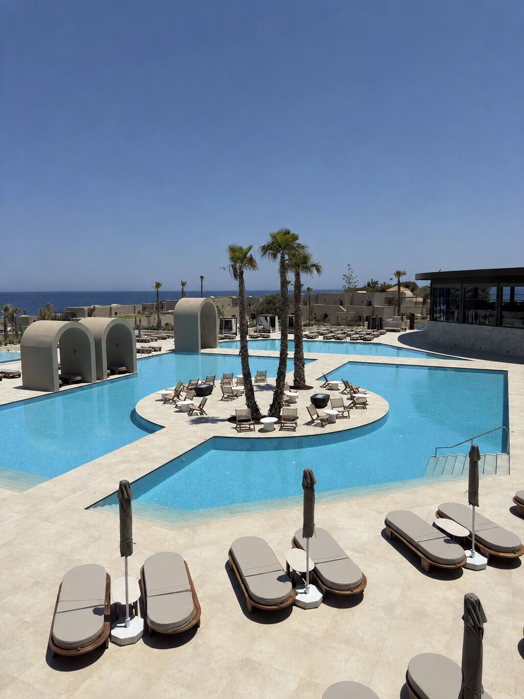 2 outdoor pools, pool umbrellas, pool loungers