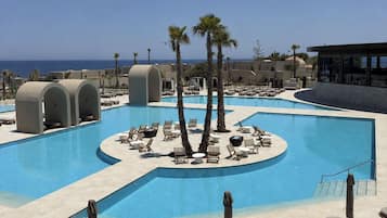 2 outdoor pools, pool umbrellas, pool loungers