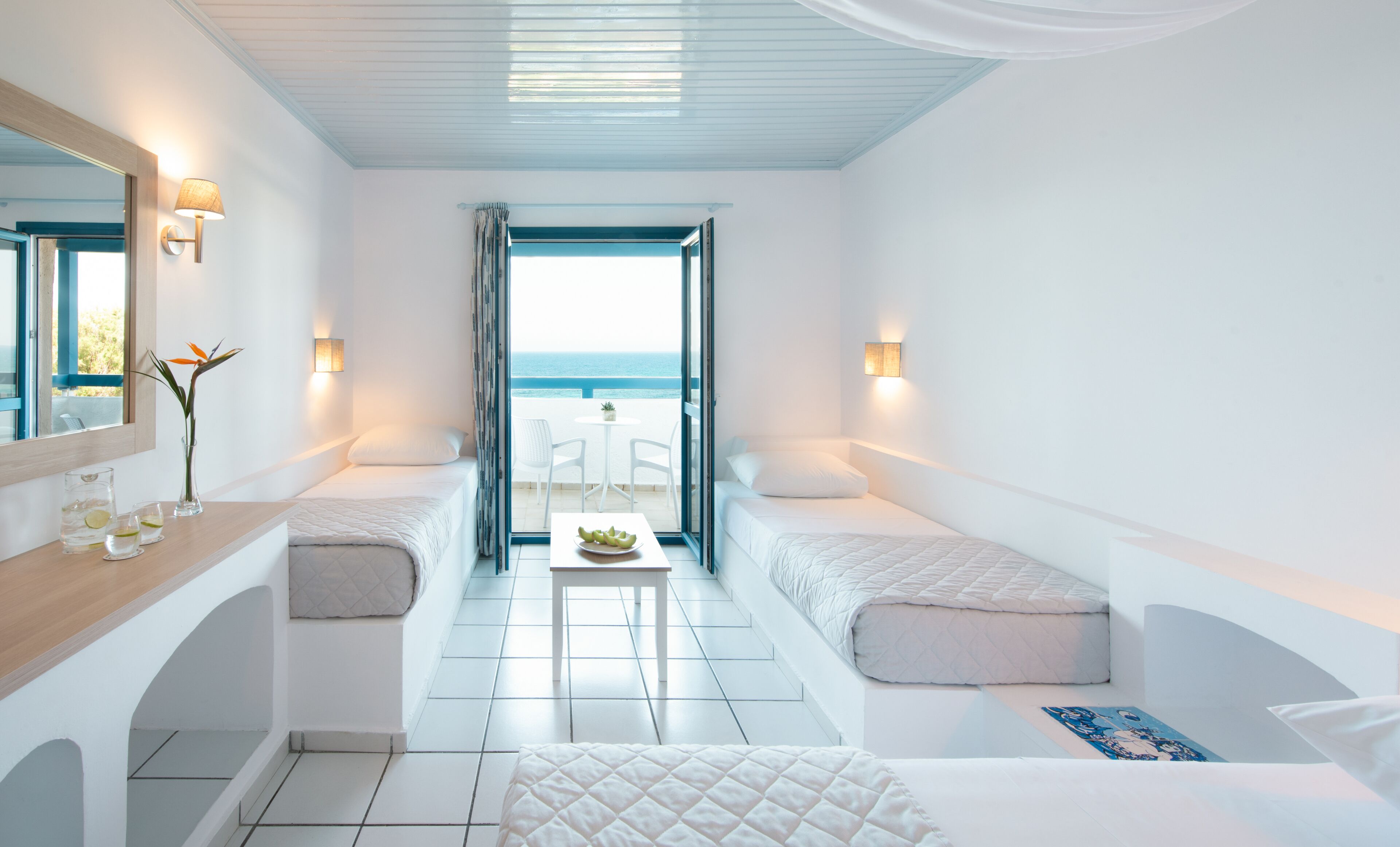 family room, sea view | in-room safe, free wifi, bed sheets