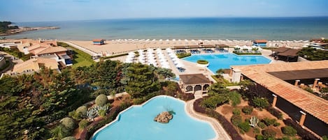 2 outdoor pools, pool umbrellas, pool loungers