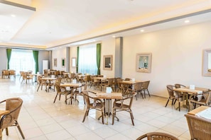 Breakfast, lunch, dinner served; international cuisine, garden views