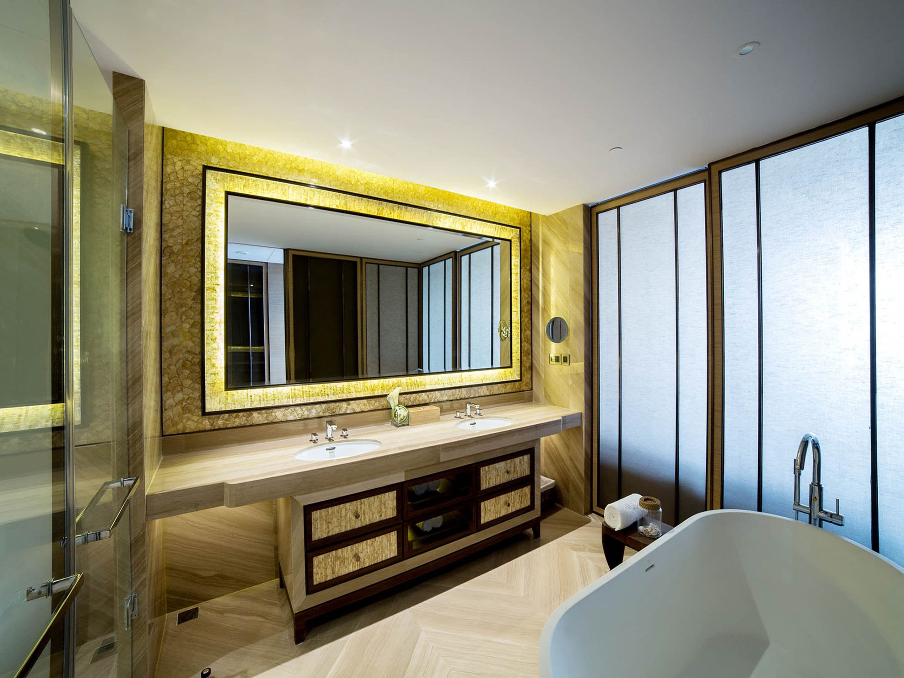 combined shower/bathtub, designer toiletries, hair dryer, slippers