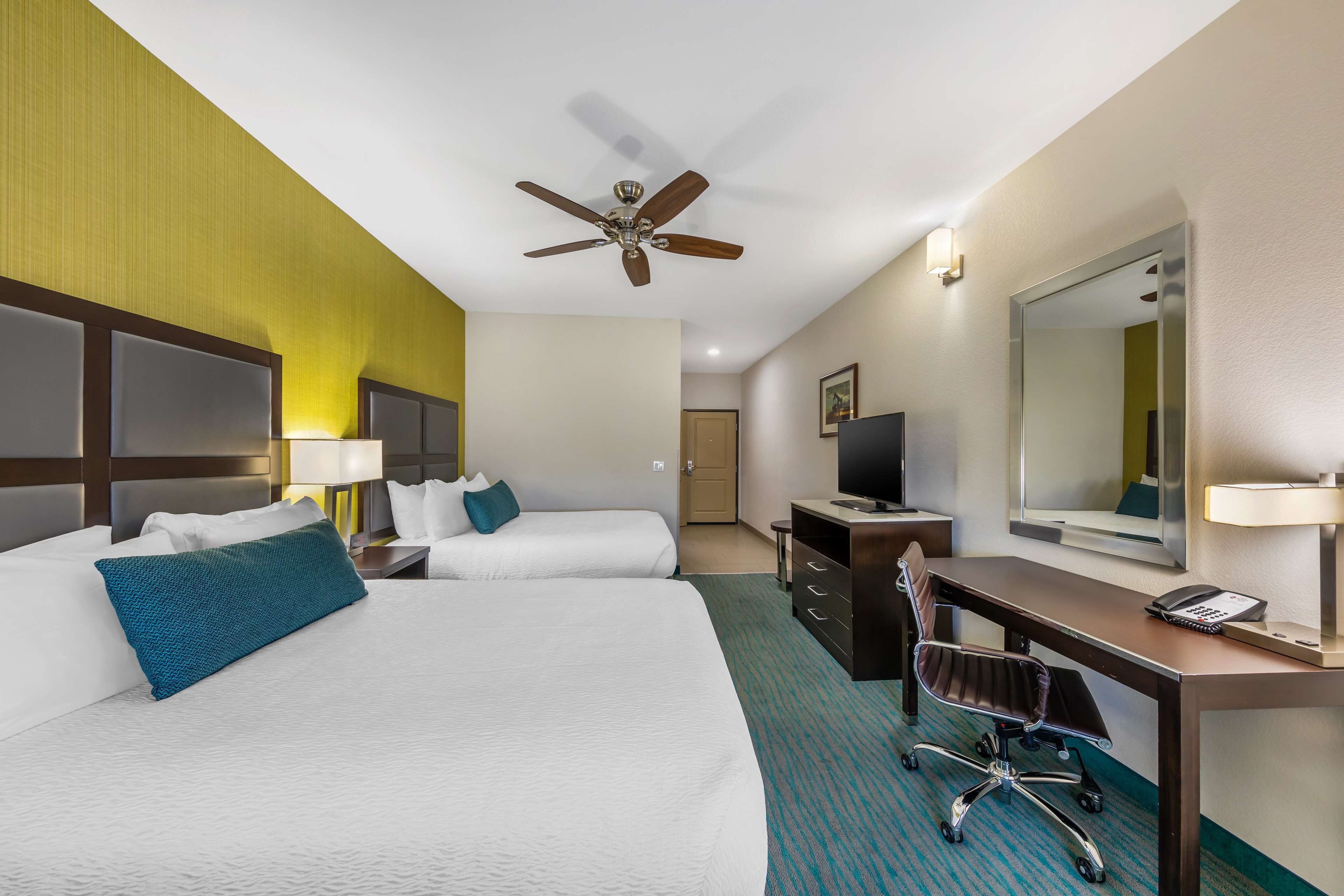 standard room, 2 queen beds, non smoking, refrigerator & microwave | 1 bedroom, individually decorated, individually furnished, desk