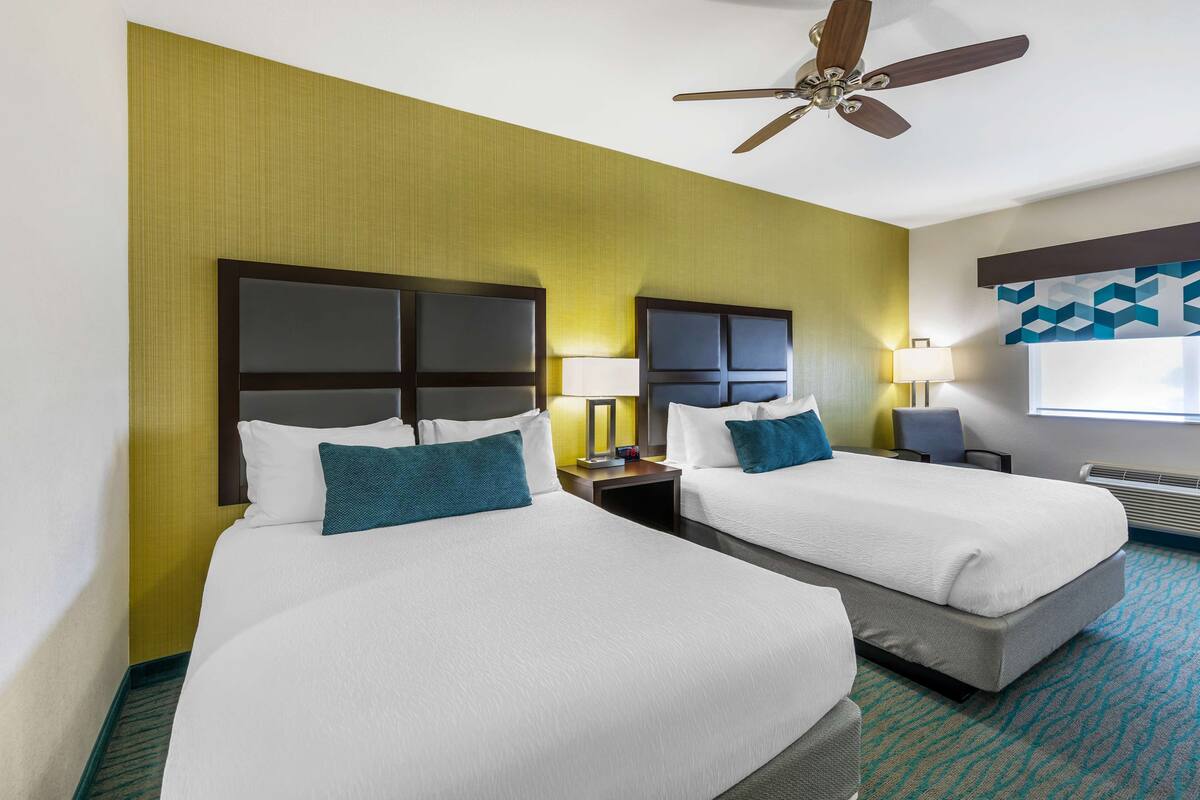 standard room, 2 queen beds, accessible, bathtub | 1 bedroom, individually decorated, individually furnished, desk