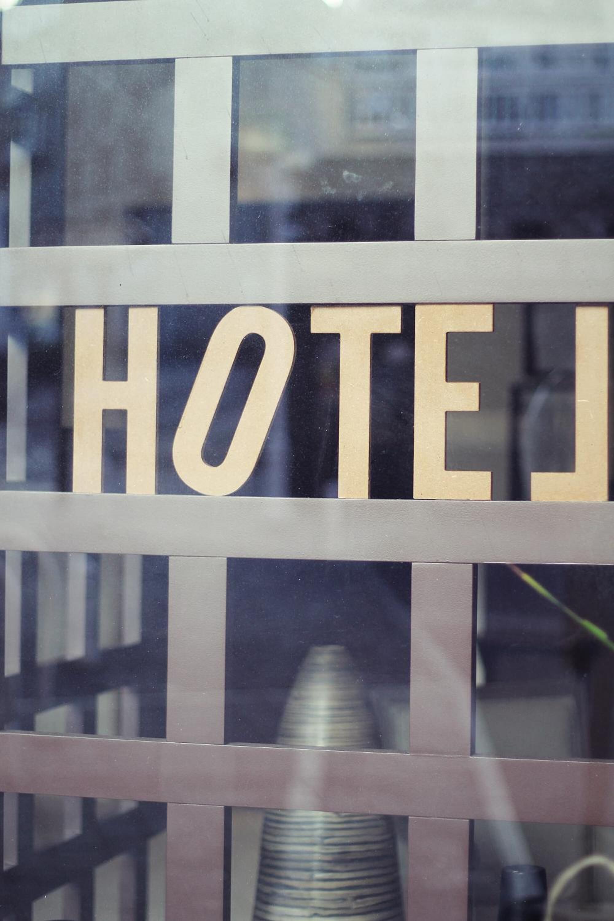 A hotel sign with the word "HOTEL" in large letters.